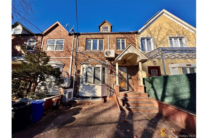 View of front facade with brick siding