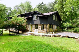 Located in the vibrant town of Warwick NY you will find this renovated gem situated on 1 acre of park like property surrounded by mature trees.