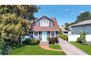 Welcome Home ! Enjoy Mornings on the Enclosed Climate Controlled Porch Perfect for Morning Coffee with Every Season.