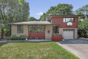 Stunningly Renovated 2 1 Bedroom Executive Home on a Rare Lot Sliding onto a Ravine.