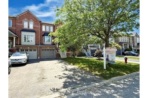 Rare find ! This beautifully maintained freehold end unit townhouse offers the space and elegance of a semi detached.