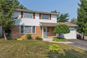 Welcome to this beautifully updated detached home with attached single car garage in the highly desirable Lakeland Acres community.