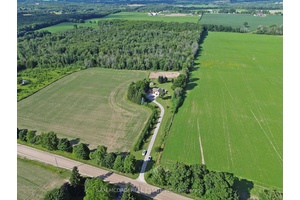 Come visit the tranquility of rural living on this stunning 47 acre property, where mature woodlands, open fields, and meandering trails create a picturesque setting for outdoor adventures and peaceful ...