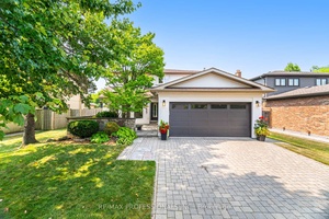 Welcome to 2357 Kenbarb Road in Gorgeous Gordon Woods Neighbourhood on Tree Lined Street !