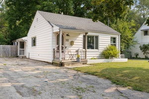 Welcome to 122 spadina road east, a charming bungalow part of St.
