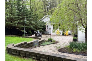 Tucked away within the woods this effortlessly chic home has every nook and cute cranny you have been craving !