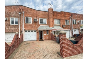 Two family brick house with water view and bridge view.