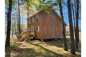 As you wind your way along the treed lane to your off grid hunt camp at Clarendon Station near Ardoch, you're not expecting to see a full grown house !