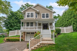 This beautiful young Colonial home, built in 2014, blends timeless charm with modern comfort.
