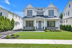 Stunning new construction in the heart of Manhasset, just steps to town and train.