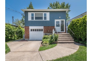 Welcome to this bright and sunny hi ranch with 3 bedrooms and 2 full baths in the Orchard Beach section of Port Washington.