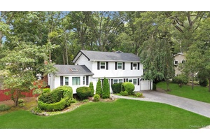 Incredible opportunity to own this magnificent, expanded, and sprawling split level Colonial situated on an oversized corner lot in the highly desirable Half Hollow Hills Central School District !