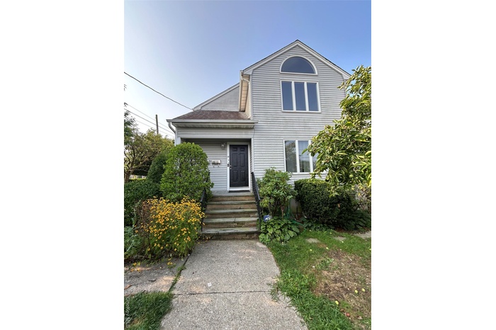 Traditional home with entry steps