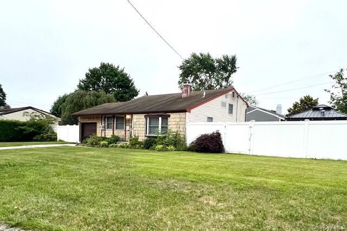 View of front facade with an attached garage