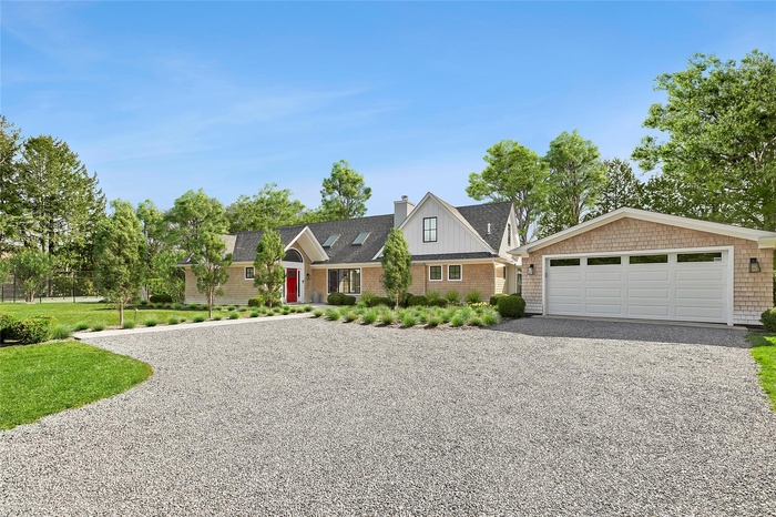 View of front of property with a garage