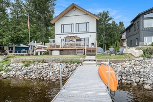 Discover unparalleled luxury and serene waterfront living in this breathtaking new build home completed in 2023.