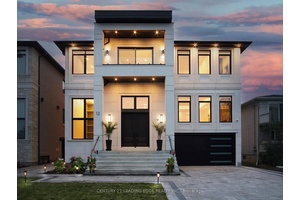 Experience timeless design and modern sophistication in this custom built luxury waterfront estate with over 5, 700sqft of finished living space !