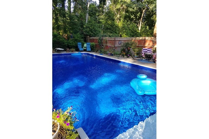 View of pool featuring a fenced backyard