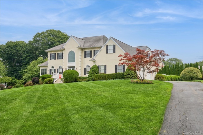 Welcome to this beautifully maintained center hall colonial with pool and luxury features