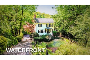 Welcome to 80 E Broadway, where storybook charm meets timeless elegance in the heart of historic Roslyn.