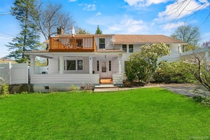 This farmhouse style home on 4.