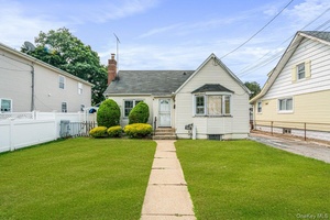 Explore this charming Updated Cape style home located in Roosevelt with New Driveway, New Ductless Energy Star Saving heating and air conditioners with new flooring, new kitchen, appliances and bathrooms ...