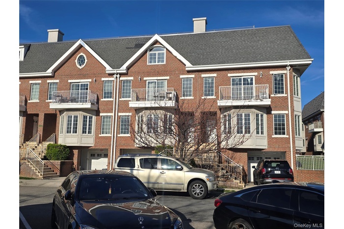 Front view of the property , facing East river water front location!