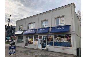 Corner building with professional office space featuring 3 private offices, board room, huge common area.