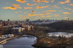 Immerse yourself in spectacular river views from every window of this south and east facing corner two bedroom, two bath apartment, complete with a private terrace.