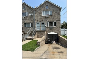 All brick multi family with cathedral ceilings, skylights, and hardwood floors throughout.
