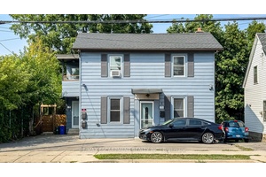 A Savvy Investors Dream Turn Key Triplex with Guaranteed Positive Cash Flow amp ; stellar tenants already in place.