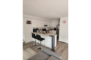 This newly built townhome in McQuesten, Hamilton offers a modern and comfortable living space with 2 spacious bedrooms and 2.