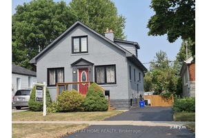 Welcome to this beautifully updated detached home that seamlessly blends modern finishes with enduring charm.