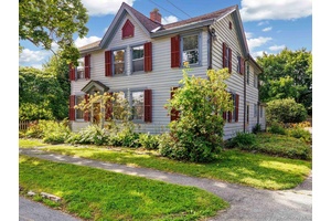 Welcome to the Briggs House, an architecturally rich 4 bedroom, 1.