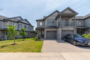 FREEHOLD TOWNHOME ! Stunning end unit townhome in the highly sought after Doon South neighbourhood of Kitchener, just minutes from Hwy 401 and steps to scenic trails, parks, and top ...