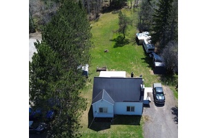 Home for sale in the heart of the beautiful unorganized community of Arnstein ON, a huge.
