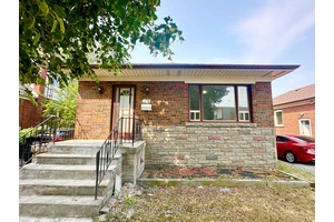 Spacious 2 bedroom, 1 bathroom main floor bungalow unit with a private entrance, located in the prime Kennedy amp ; Lawrence area.