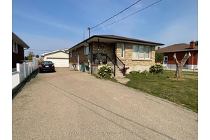 AVAILABLE OCTOBER 1ST 2 Bedroom 3 Bathroom Bungalow Lower Level unit beautifully updated with new kitchen, bright Living room.