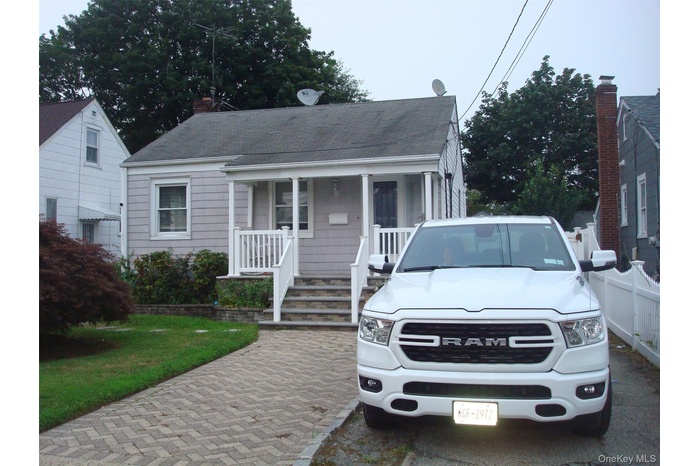 Bungalow-style home with covered porch