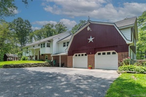 This spacious and impeccably maintained oversized raised ranch offers comfort, flexibility, and pride of ownership in every room.