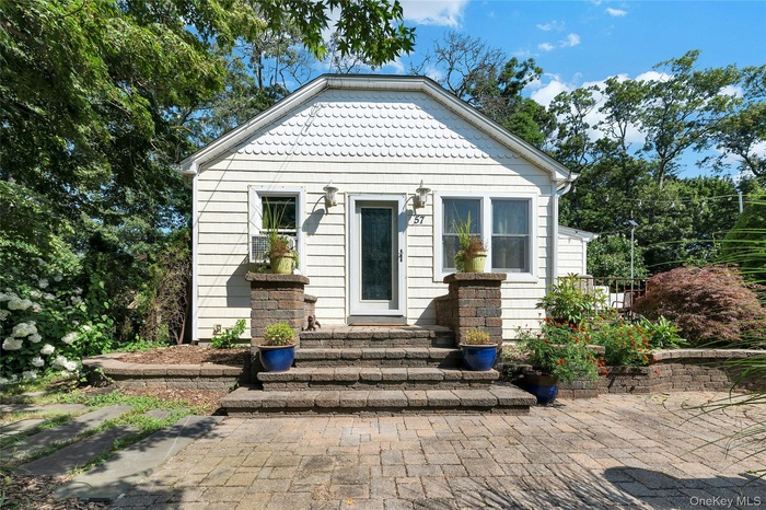 Charming Ranch With Beautiful Paver Walkway