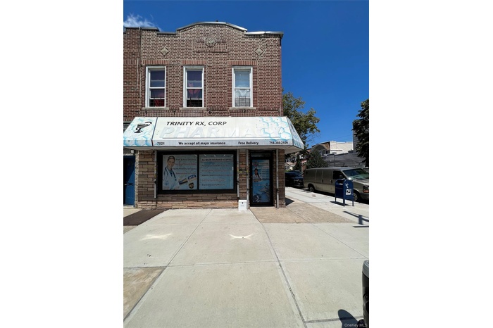 View of front of house featuring brick siding