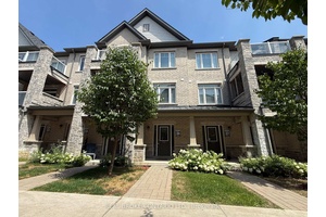 When you enter this thoughtfully designed townhouse, the main floor welcomes you with a generous open concept family room that can effortlessly serve as a home office, a fitness area ...