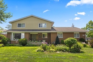 Traditional Family Home with Detached Shop on the Edge of Town.