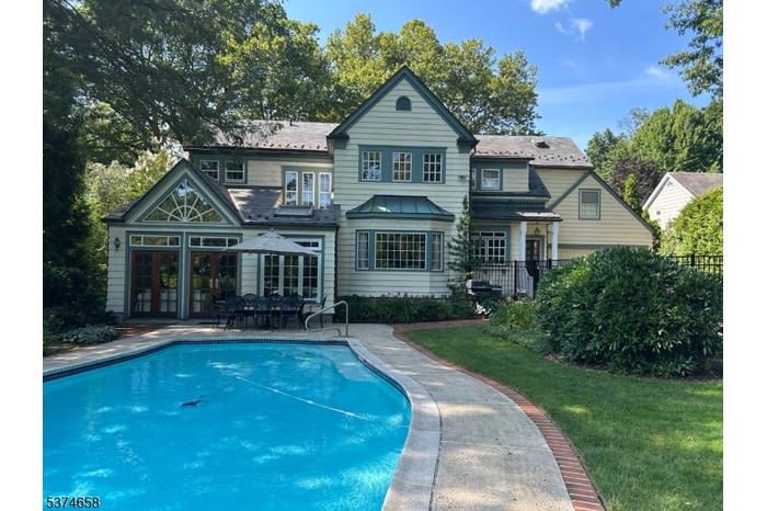 REAR VIEW OF RESIDENCE w/ POOL