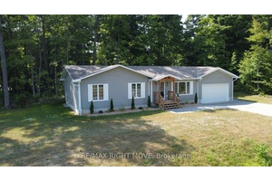 This beautifully remodelled 3 bedroom bungalow offers modern comfort in a peaceful lakeside setting.