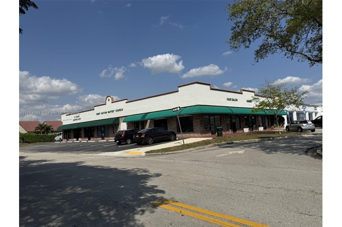 Corner of Sample Rd. & NW 99th Way.