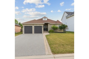 PRICED TO SELL ! ! Welcome to 38 Royal Amber Crescent a charming all brick bungalow nestled on a quiet, family friendly crescent in the heart of Mt.