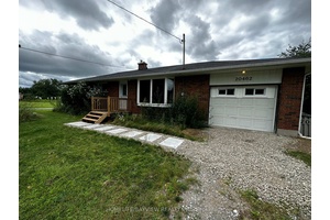 Rent the main floor of this beautifully maintained 3 bedroom, 1 bath bungalow, featuring a generous layout, large windows, and serene surroundings.