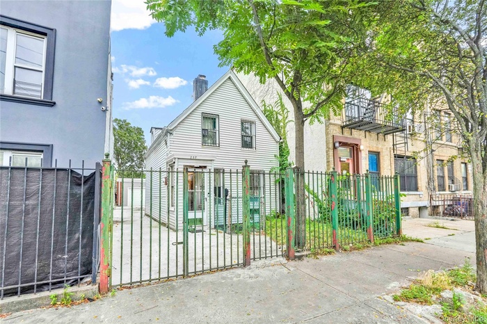 Gate with a fenced front yard